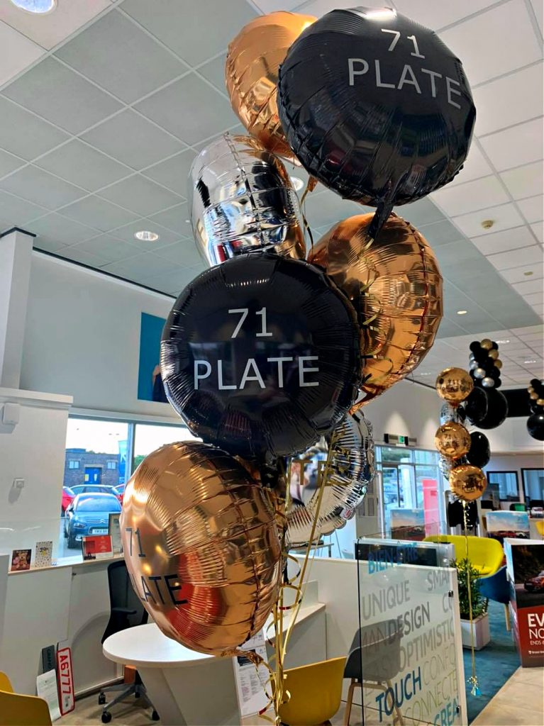 Foil balloons personalised for car showroom event