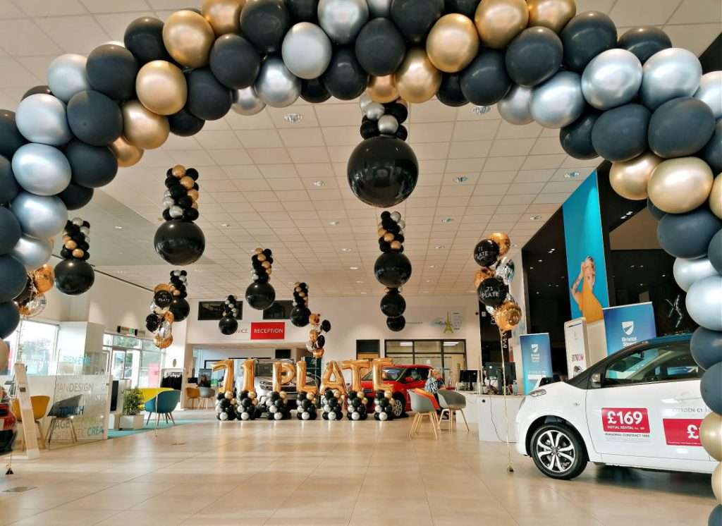 Balloon decoration and installation for car show rooms