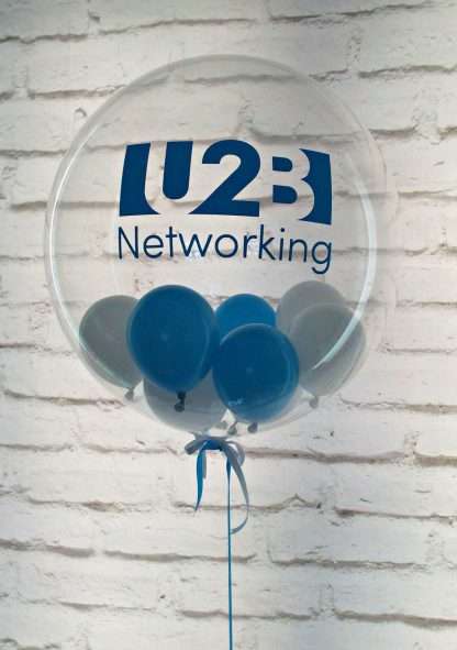 Clear bubble balloon with miniature balloons inside and company logo