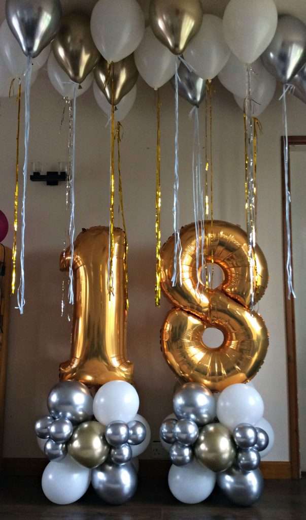 Number balloon pillars with matching ceiling balloons - Stafford