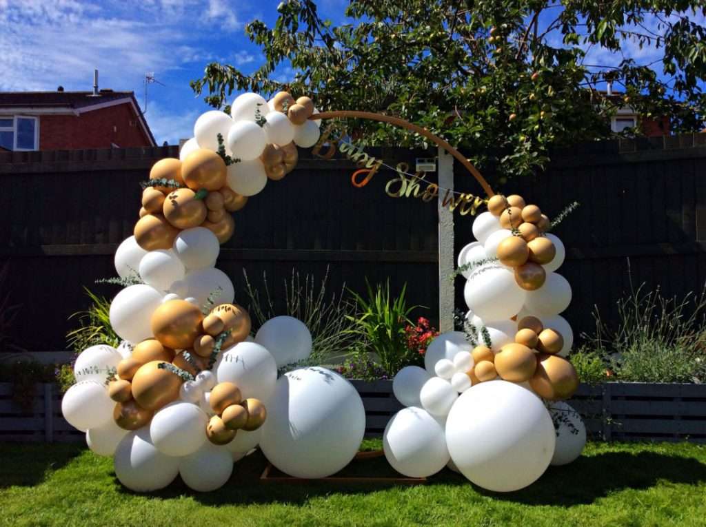 Gold and white balloon hoop for baby shower in Telford, Shropshire