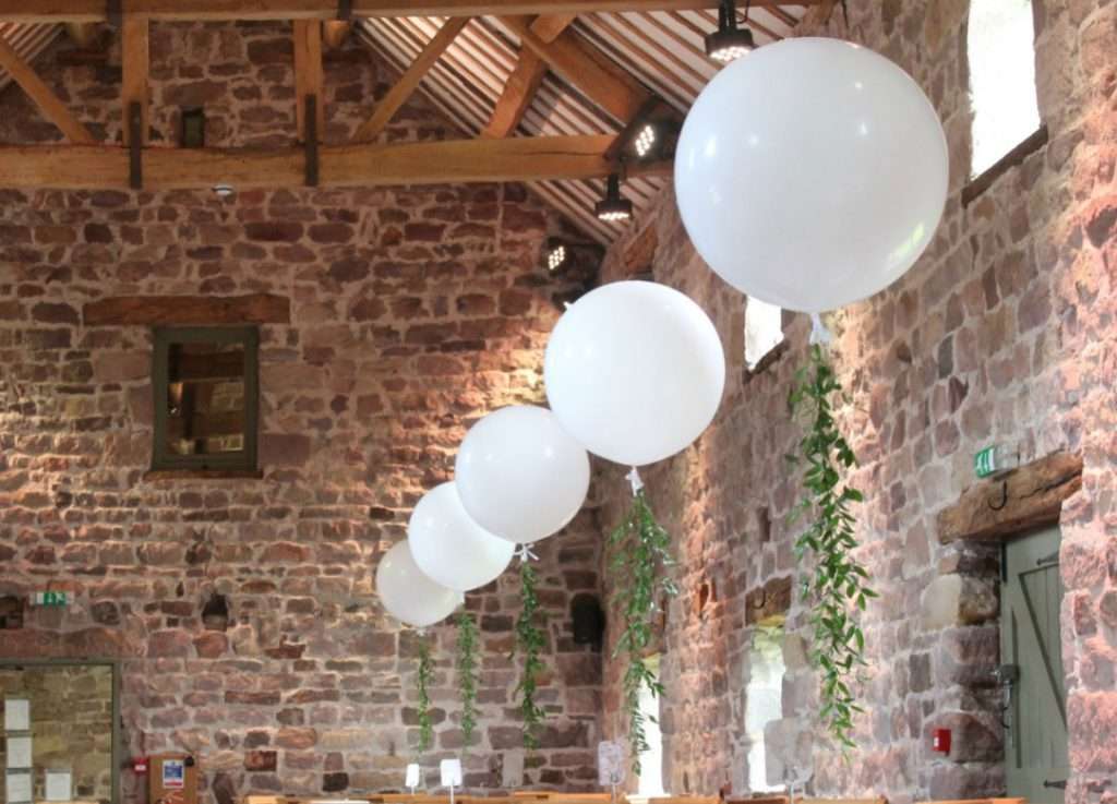 Giant balloons with fresh foliage at The Ashes wedding venue in Staffordshire