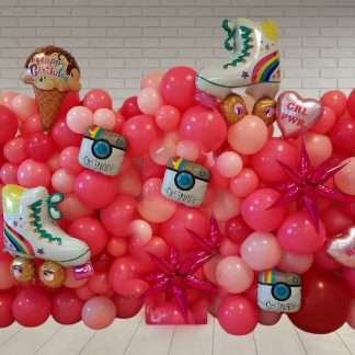 Organic balloon wall with a Barbie theme for children's birthday