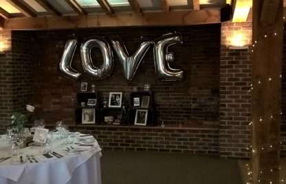 LOVE wedding display with helium balloon letters