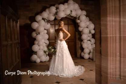 Organic balloon arch at the entrance of Standon Hall wedding venue